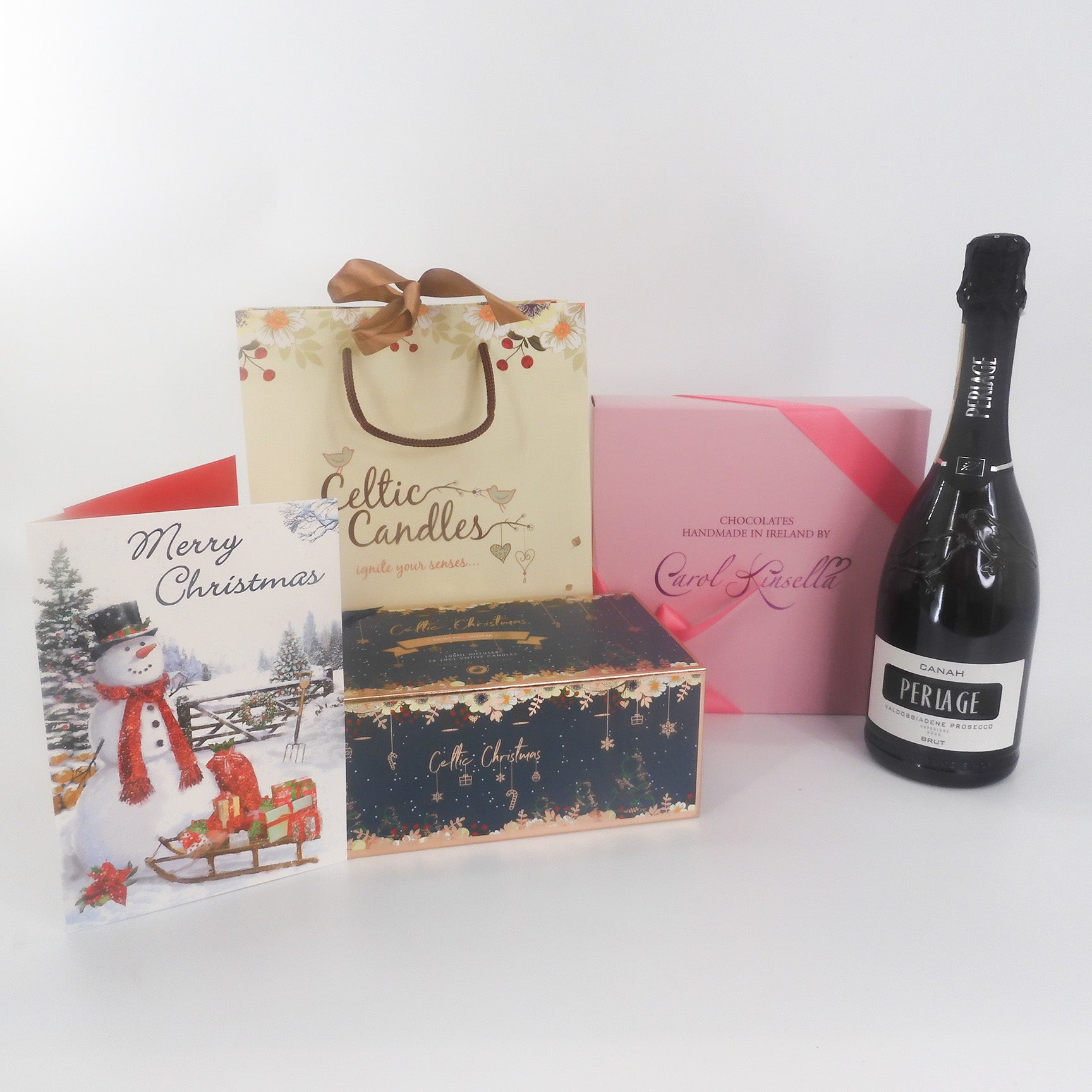 Luxurious Christmas gift set complete with Periage prosecco, Celtic Christmas candle set, Irish Carol Kinsella chocolates, and a lovely Merry Christmas card