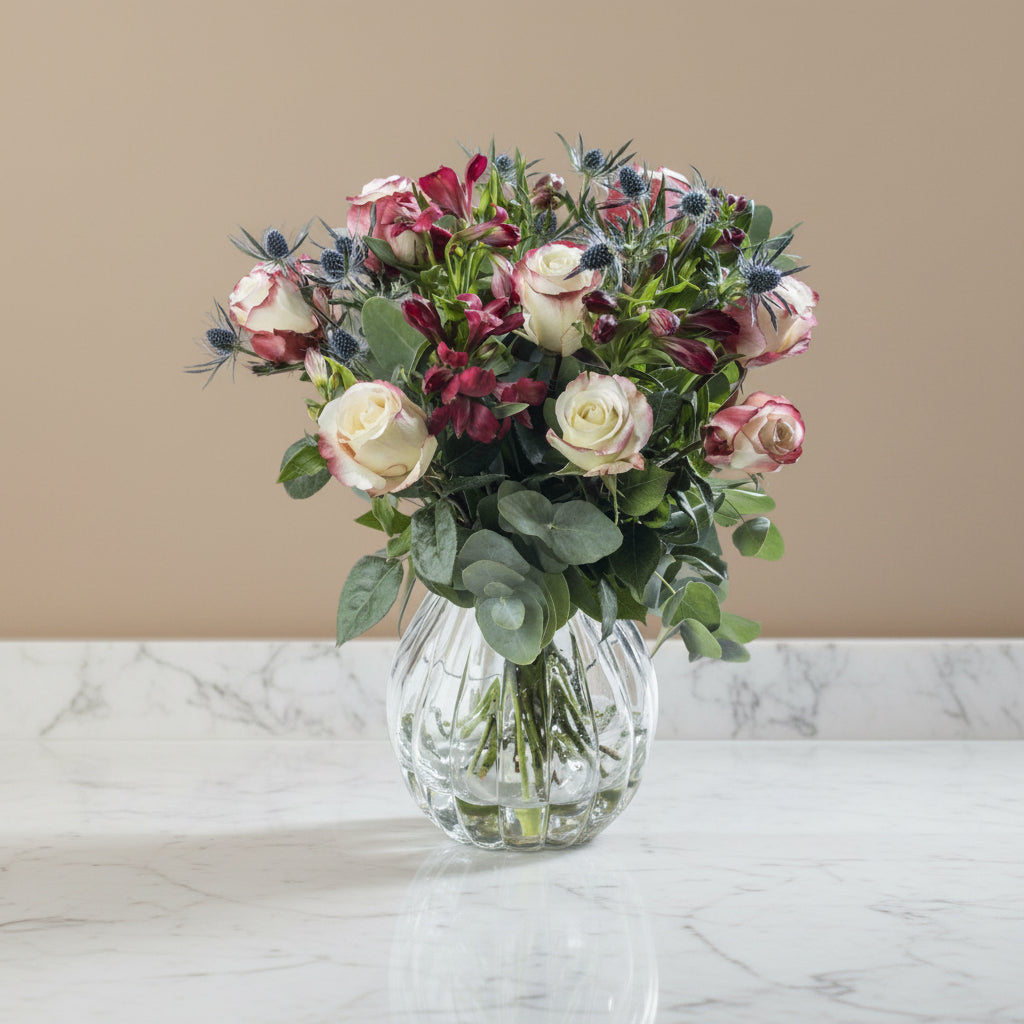 Sweetness rose flower bouquet in a glass vase