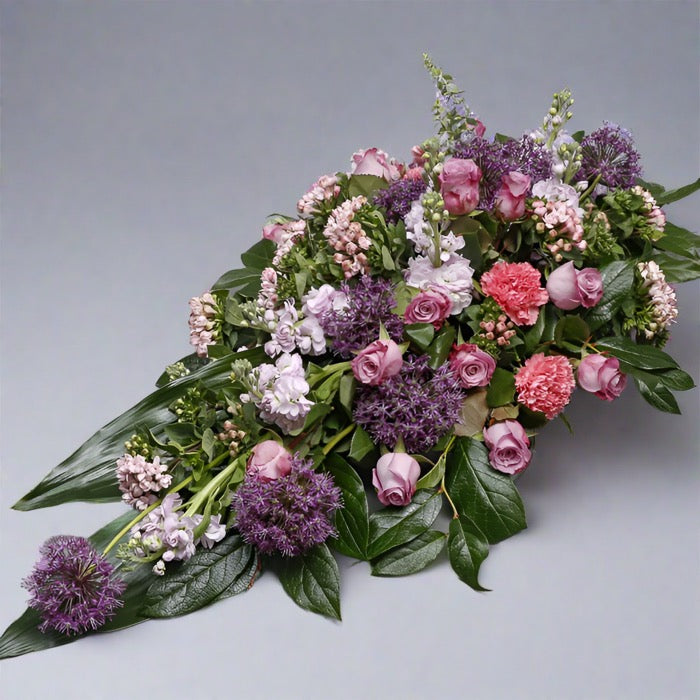 Angled view of Sympathy funeral spray