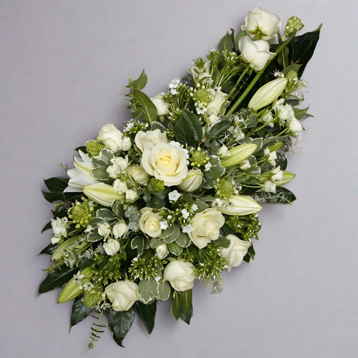 White sympathy funeral spray