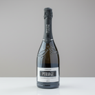Bottle of Periage Canah Prosecco on a gray background