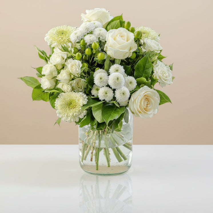 White flowers bouquet in a glass vase