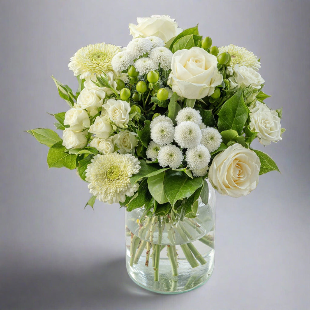 White flowers bouquet in a glass vase