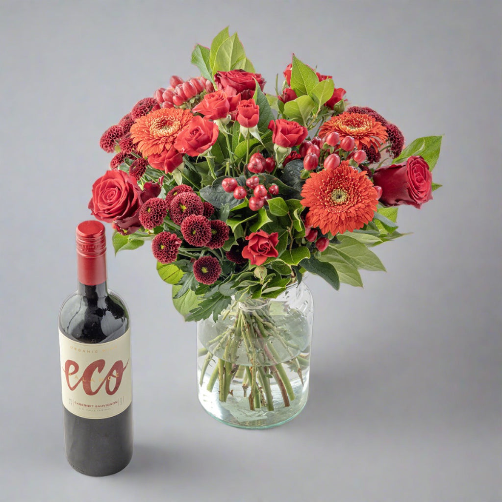 Reds flower bouquet with cabernet sauvignon organic bottle of red wine