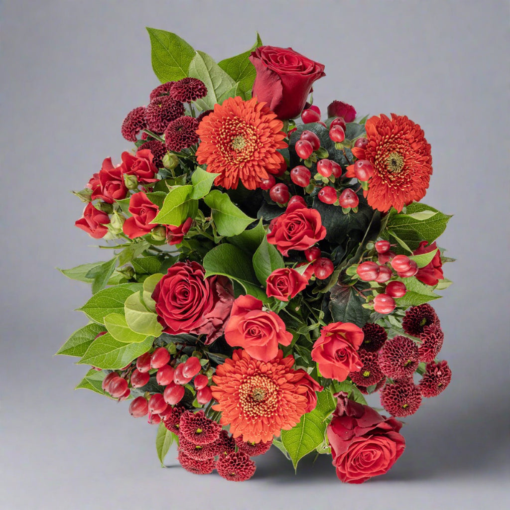 Top down view of red flowers bouquet