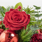Close up view of Christmas reds tabletop bouquet