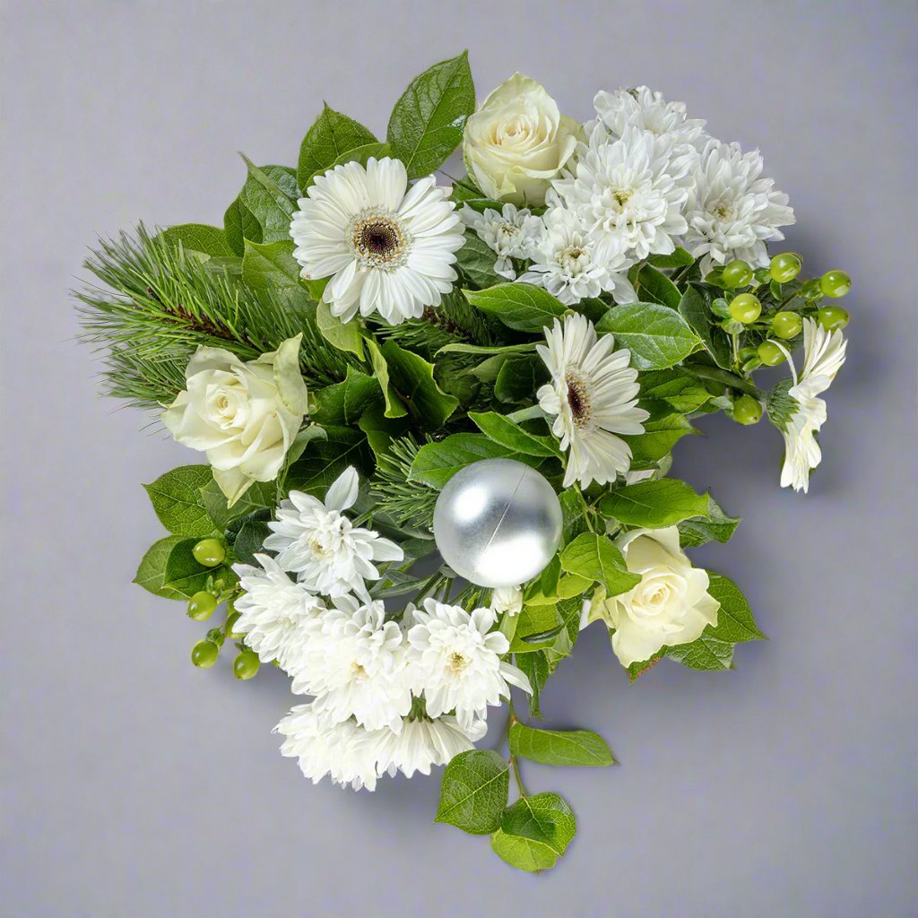 Top down view of Christmas white roses bouquet