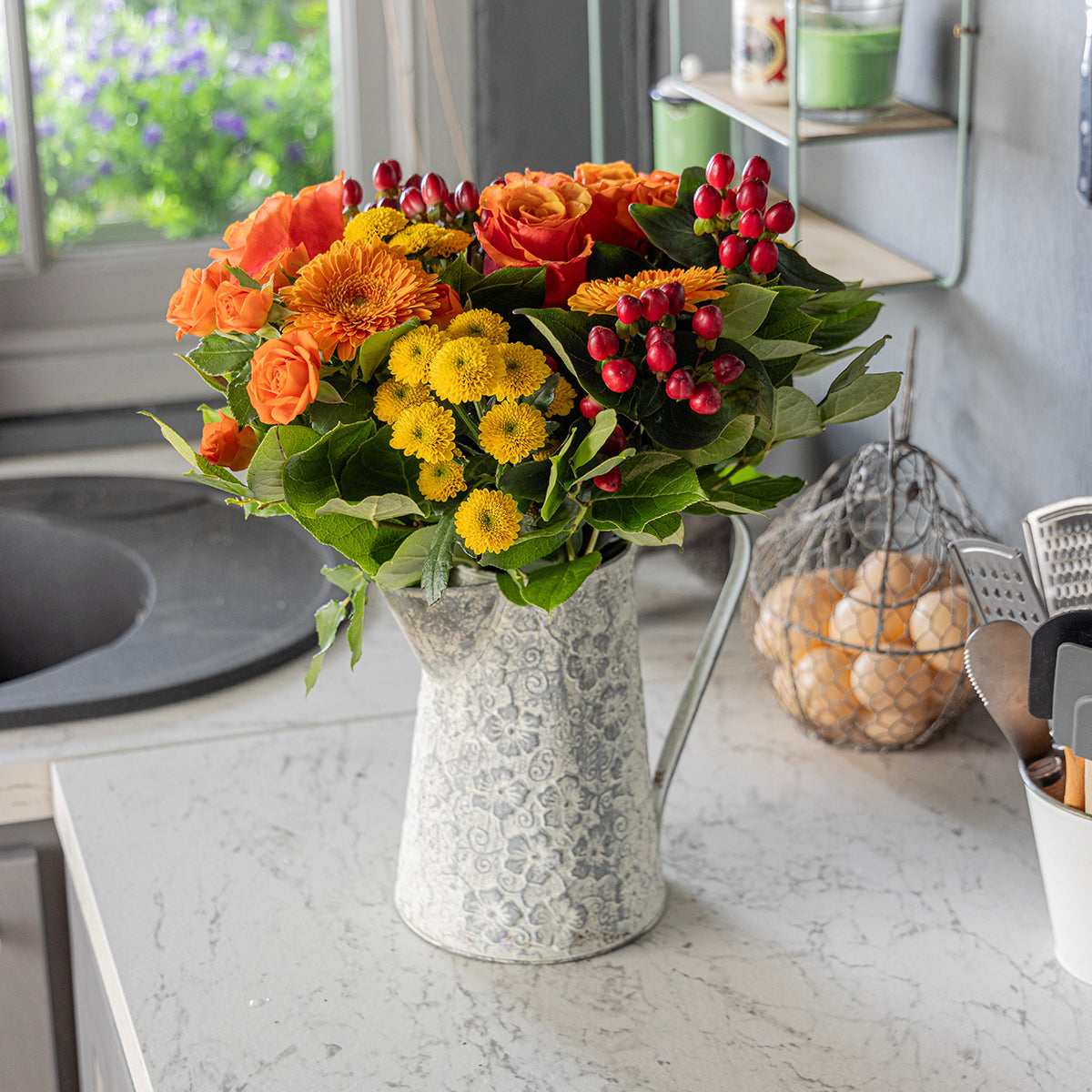Lifestyle picture of Citrus bouquet and prosecco bottle