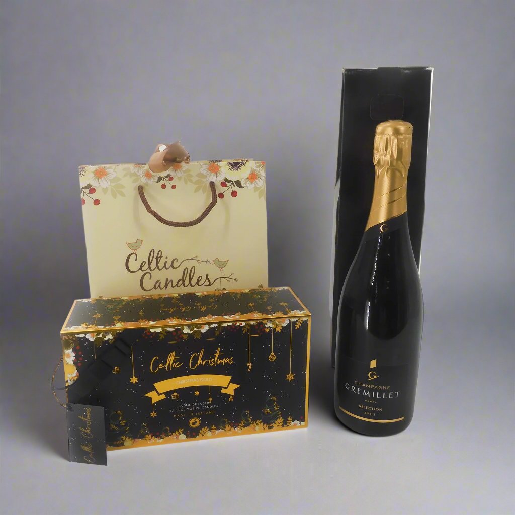 Christmas gift set with Gremillet champagne, a Celtic Christmas candle set, and a diffuser