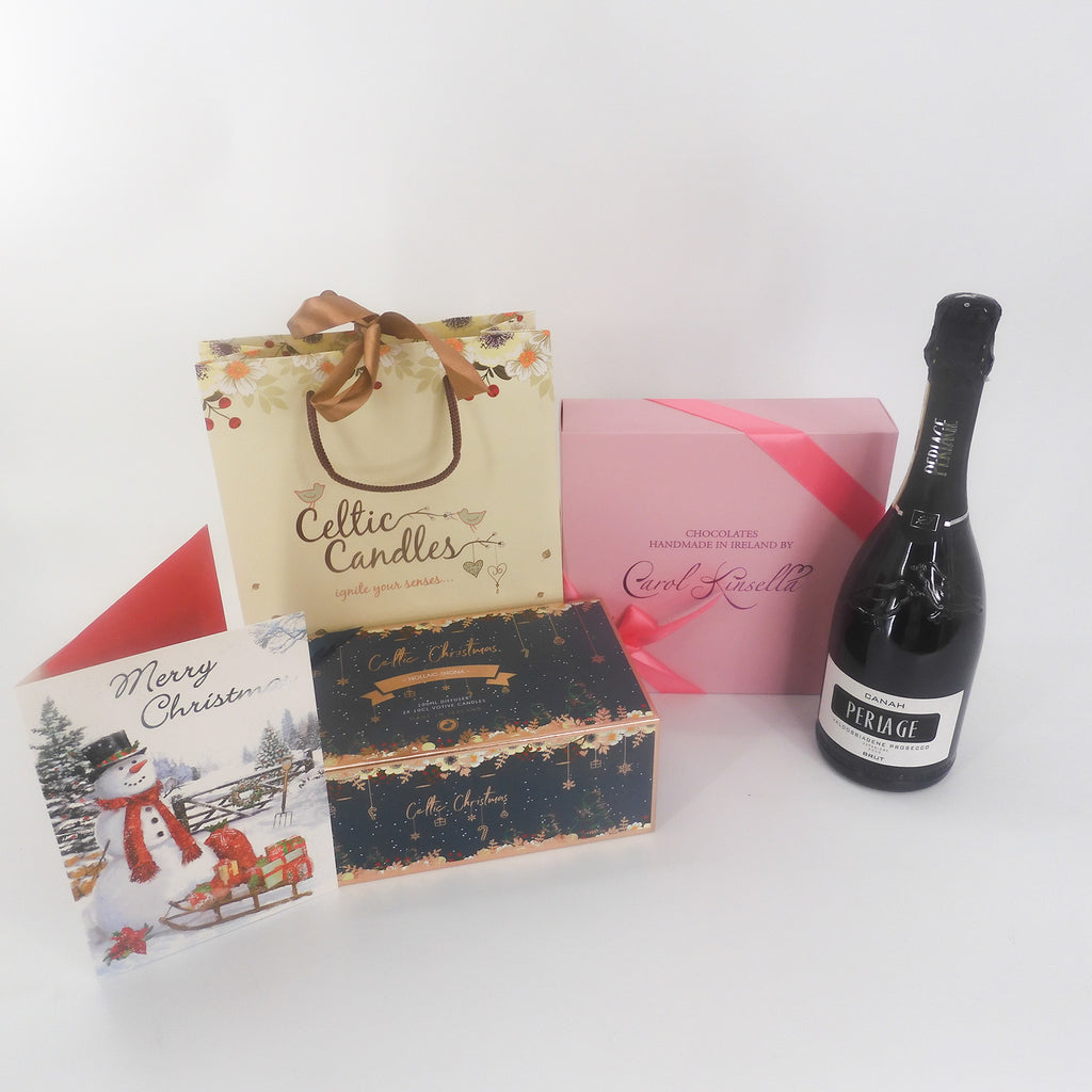 Luxurious Christmas gift set complete with Periage prosecco, Celtic Christmas candle set, Irish Carol Kinsella chocolates, and a lovely Merry Christmas card from a higher angle