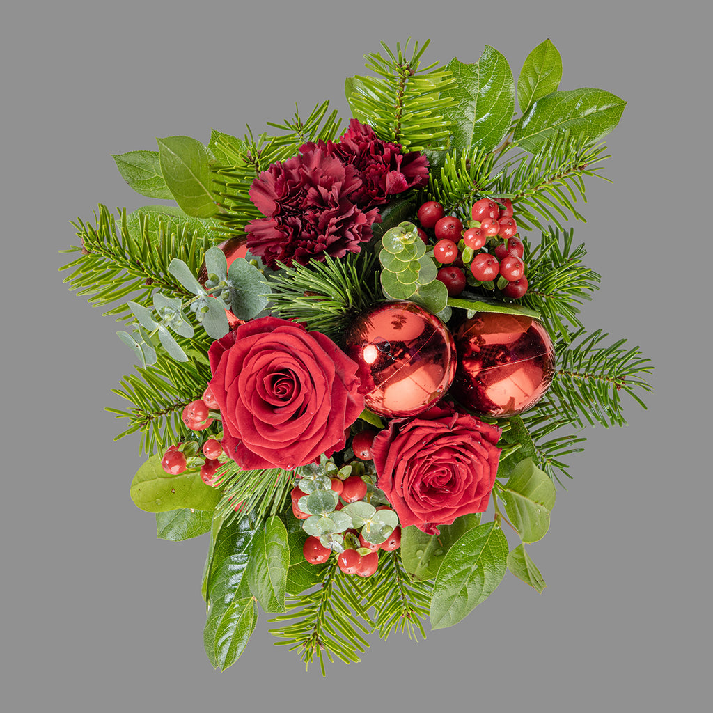 Top down view of Christmas reds tabletop bouquet