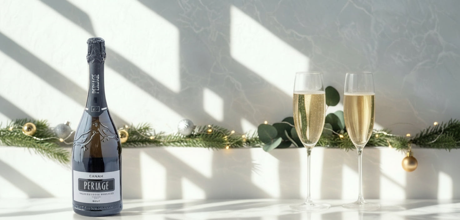 Perrier Champagne bottle with two flutes on a light background