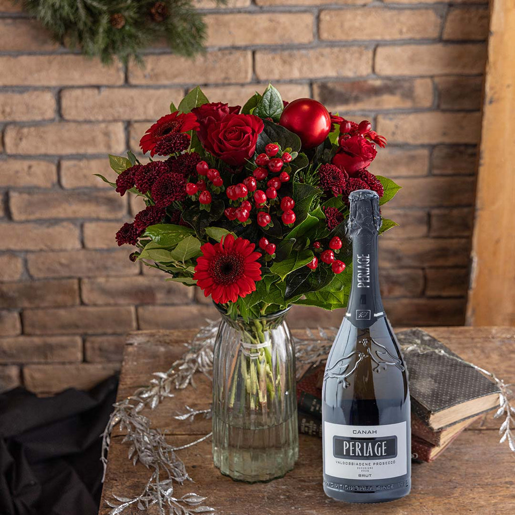 Lifestyle picture of Christmas red roses bouquet and prosecco