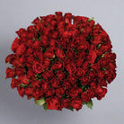 Top down view of 100 red roses flower bouquet