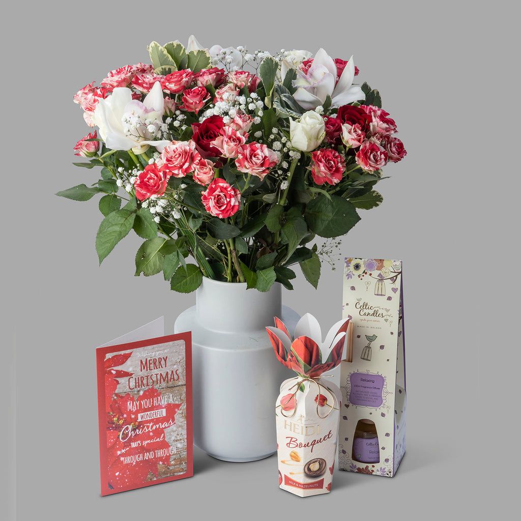Christmas Sparkle flower bouquet with Merry Christmas card, chocolates, and a diffuser
