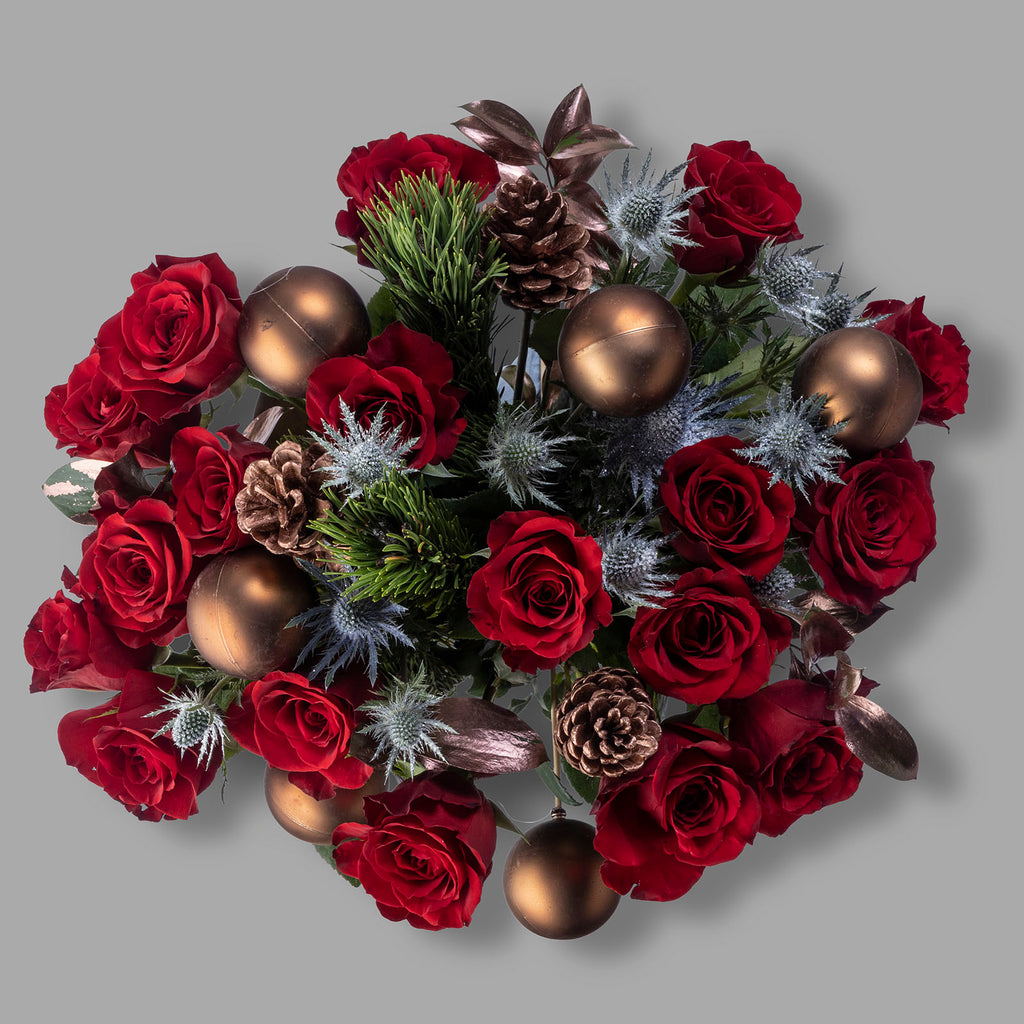 Top down view of Christmas velvet red roses bouquet