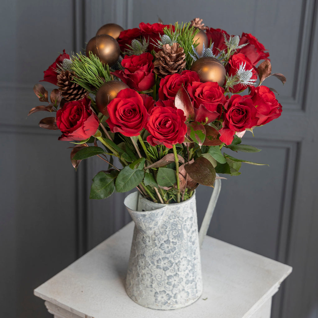 Lifestyle picture of Christmas velvet red roses bouquet