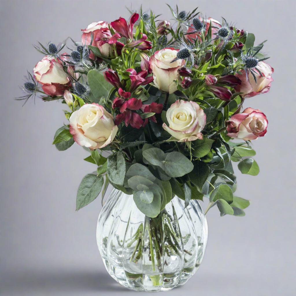 Sweetness rose flower bouquet in a glass vase