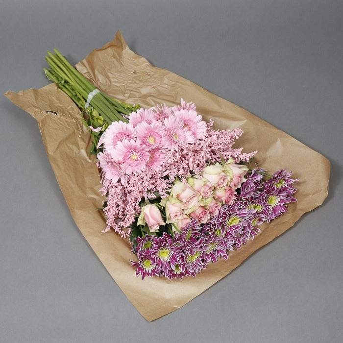 Pink flowers in paper wrapping
