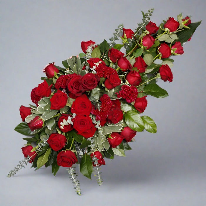 Red rose funeral spray
