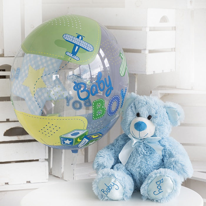 Blue balloon and teddy with baby boy written on the balloon