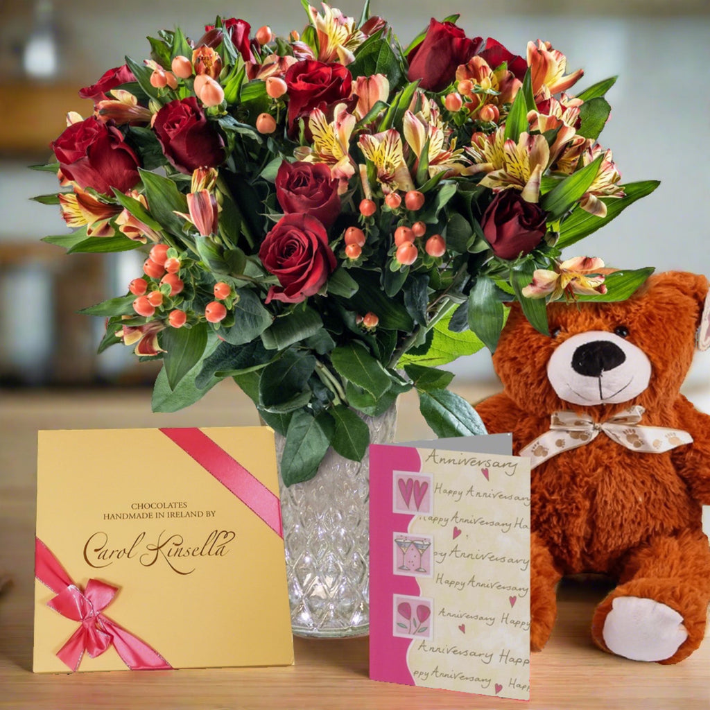 Dreamcatcher flower bouquet with chocolates, a card and a teddy bear